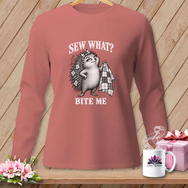 Dusty pink long-sleeve t-shirt with a humorous graphic of a hedgehog holding a quilt and the text Sew What? Bite Me.
