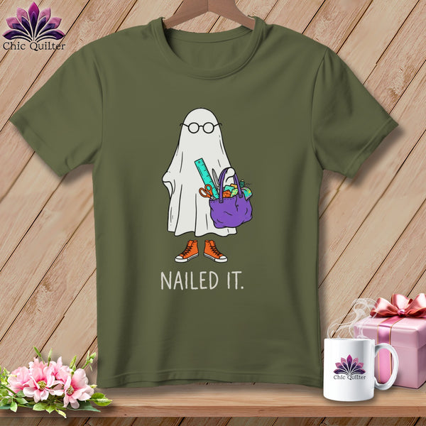 Ghost with glasses holding sewing supplies and text "NAILED IT."
