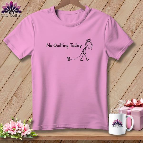 Pink t-shirt with "No Quilting Today" text and stick figure graphic.