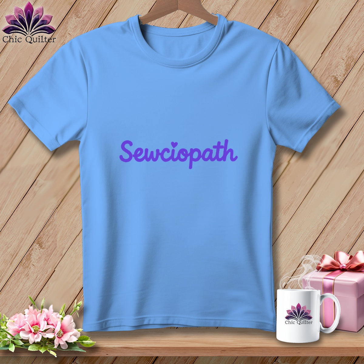 Light blue t-shirt with purple "Sewciopath" text and a heart.