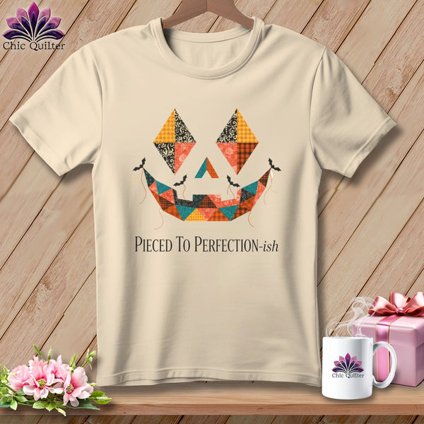 Cream t-shirt with a patchwork jack-o'-lantern face design and text.