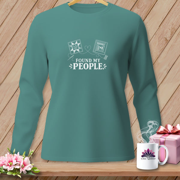 Teal long-sleeve shirt with "Found My People" and quilting graphics.