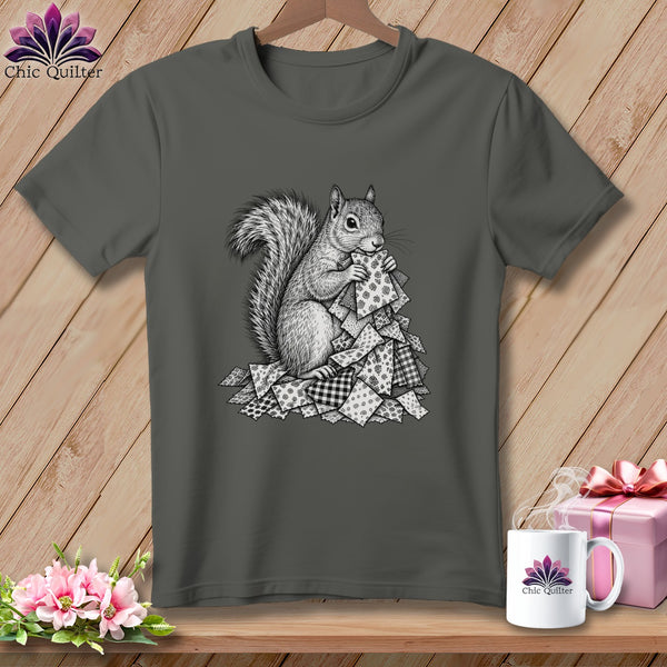 Dark gray t-shirt featuring a black and white sketch of a squirrel holding patterned quilt squares.