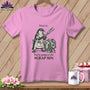 Pink t-shirt with drawing of a penguin holding scissors over a basket of fabric scraps.