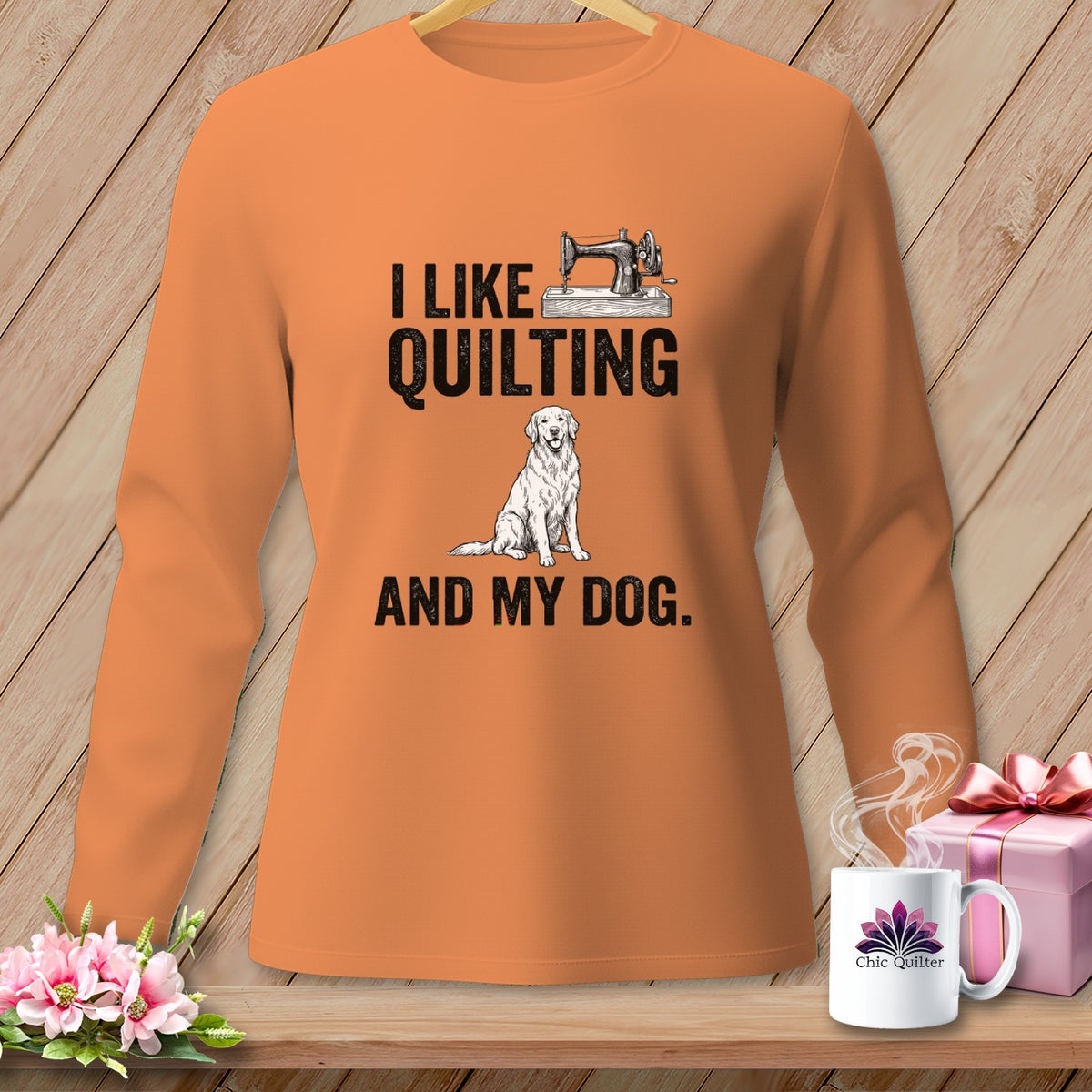 Orange long-sleeve shirt with "I Like Quilting and My Dog" text and graphics.
