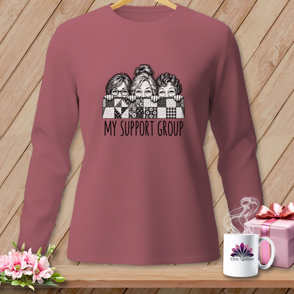 Long-sleeved shirt with graphic of three women peeking over a quilt and text "MY SUPPORT GROUP".