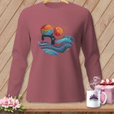 Long-sleeve shirt with sewing machine, sun, and fabric waves graphic.