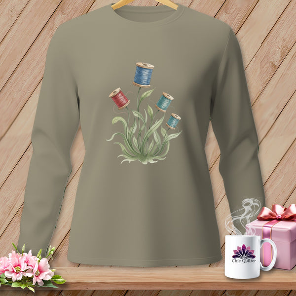 Long-sleeve shirt with watercolor spool of thread floral design and "Chic Quilter" mug.