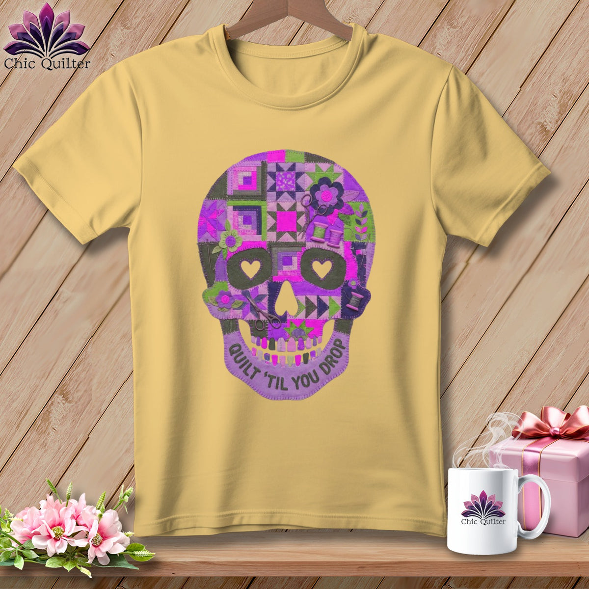 Yellow t-shirt with a purple patchwork skull graphic and text "Quilt 'Til You Drop".