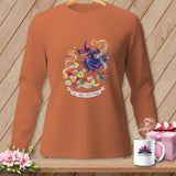 Long-sleeve shirt with a witch on a broom, a patchwork quilt, and text 