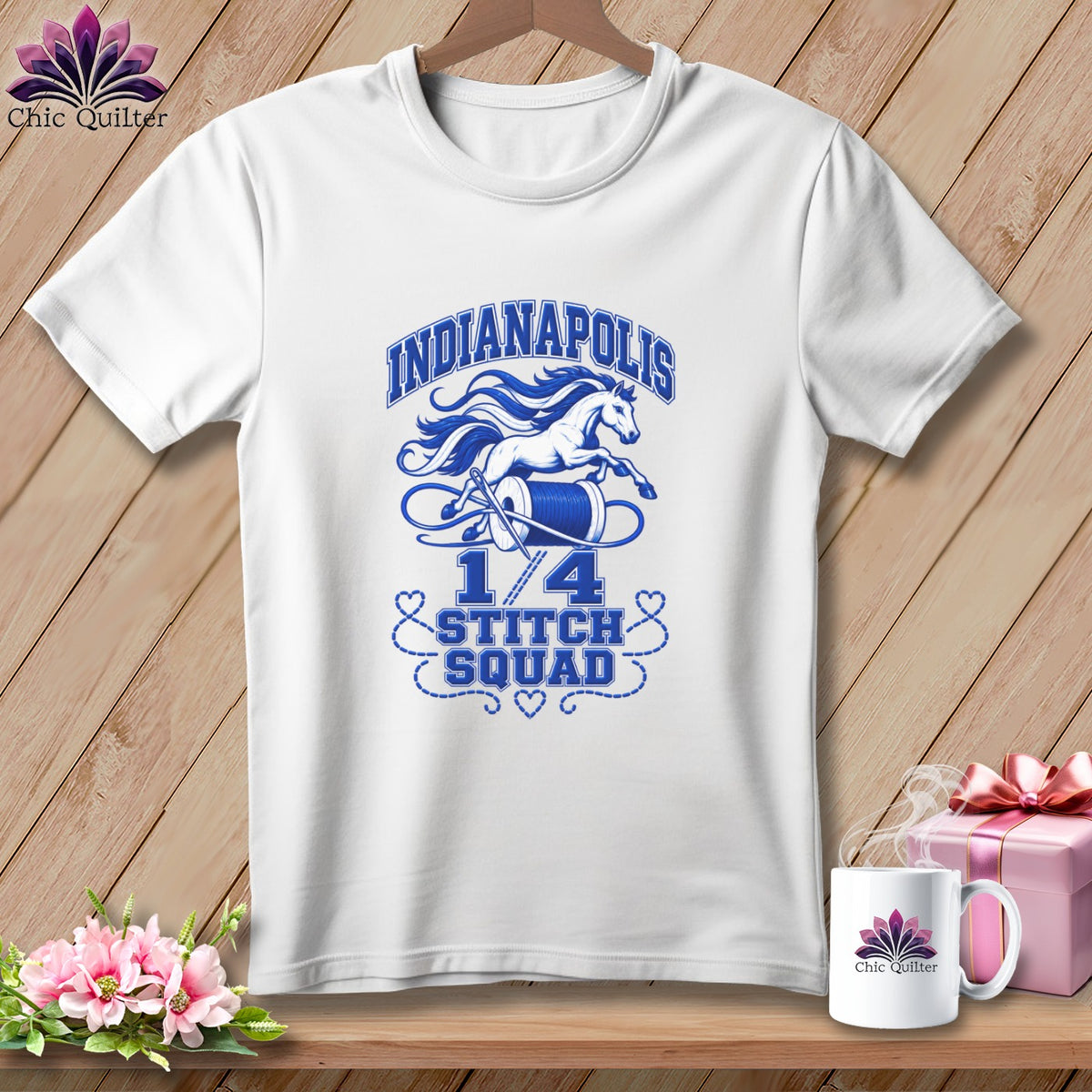 White t-shirt featuring blue Indianapolis 1/4 Stitch Squad graphics with a galloping horse, spool, and sewing needle.
