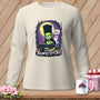 Crewneck long-sleeve shirt with a "Haunted Stitches" graphic of a green witch at a sewing machine.