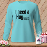 Turquoise long-sleeve shirt with text 