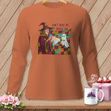 Witch holds flashlight next to ghost on quilt, 