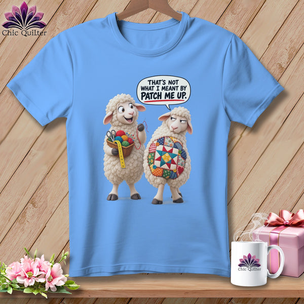 Two sheep, one with quilting supplies, the other with a quilt patch, text says "Patch me up."