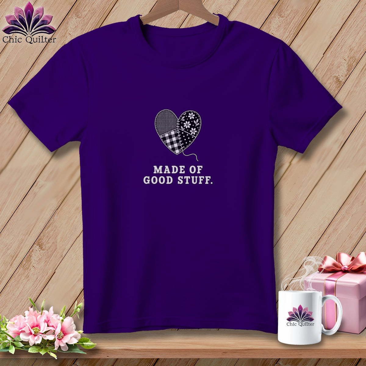 Purple t-shirt with quilted heart graphic and "Made of Good Stuff" text.