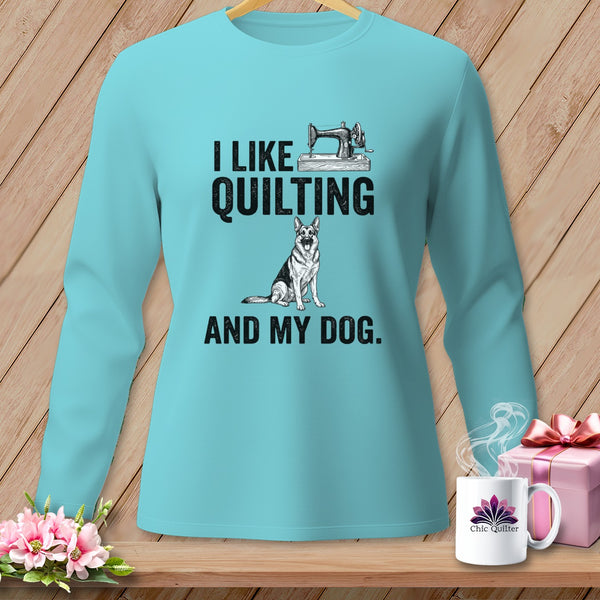 Teal long-sleeve shirt with text and graphic of a sewing machine and German Shepherd.
