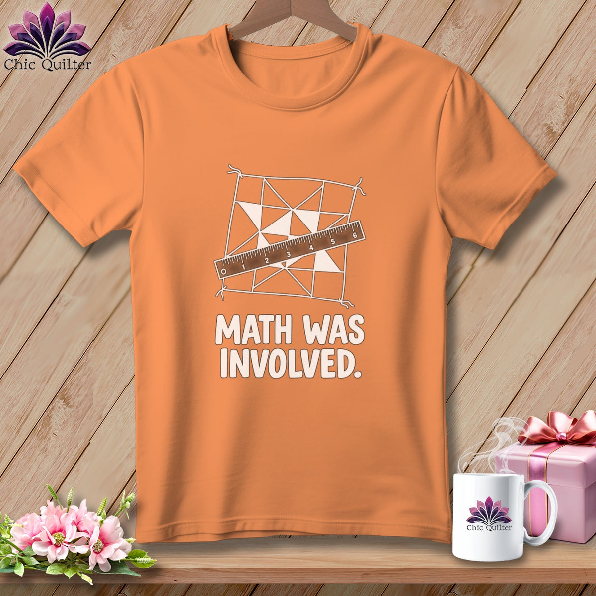 Orange t-shirt with geometric pattern, ruler, and "MATH WAS INVOLVED." text.