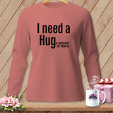 Salmon long-sleeve shirt with black text 