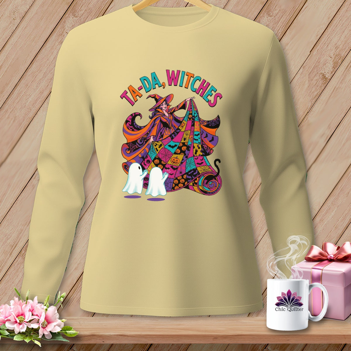 Long sleeve shirt with witch, ghosts, and "Ta-da, Witches" text.