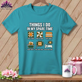 Teal t-shirt featuring humorous quilting graphics and text hanging against a wooden wall.