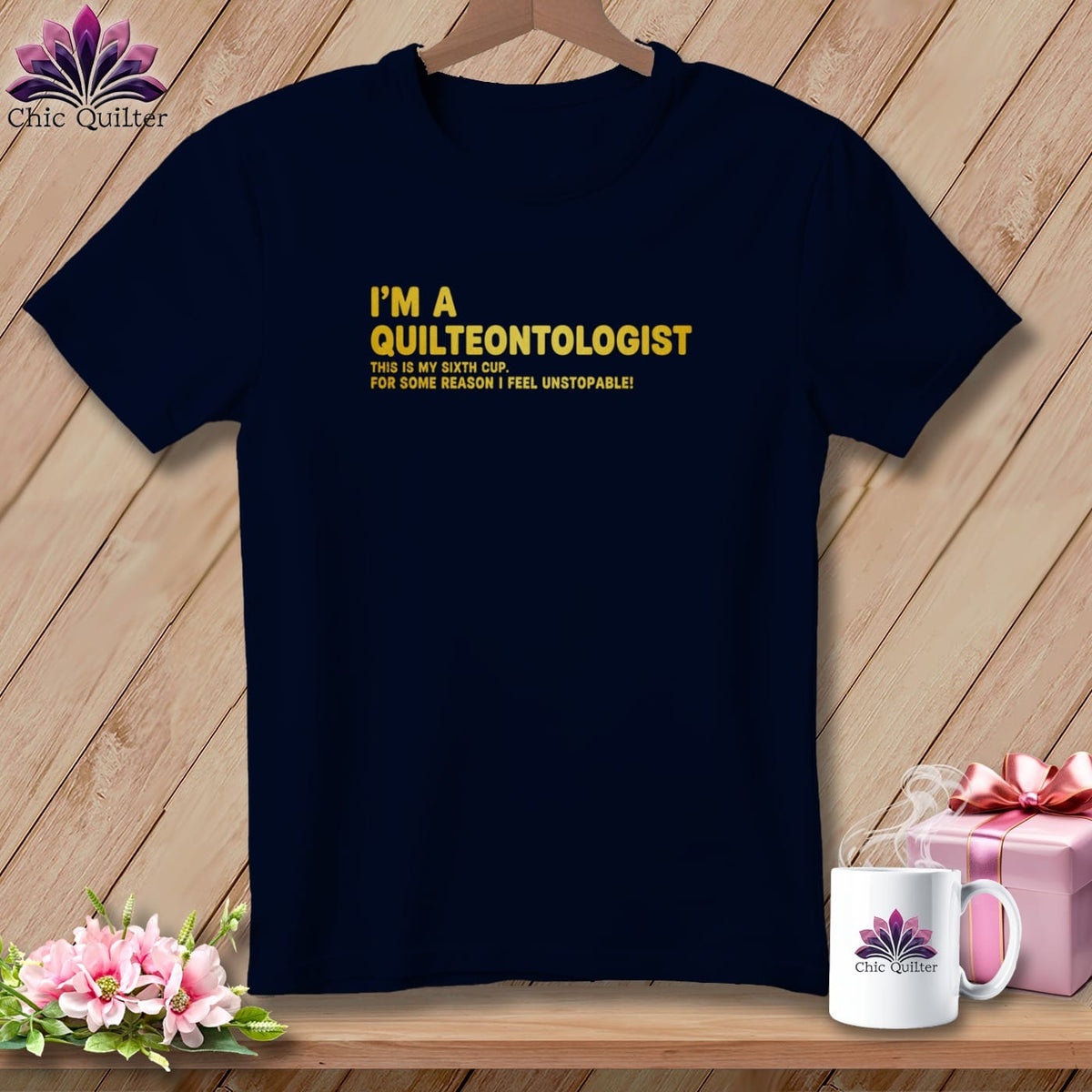 Navy t-shirt with yellow text "I'm a Quilteontologist".