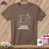 Brown t-shirt with white line drawing of a sewing machine and 