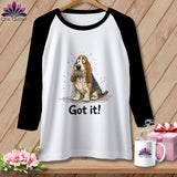 T-shirt with a cartoon basset hound entangled in colorful yarn, saying 