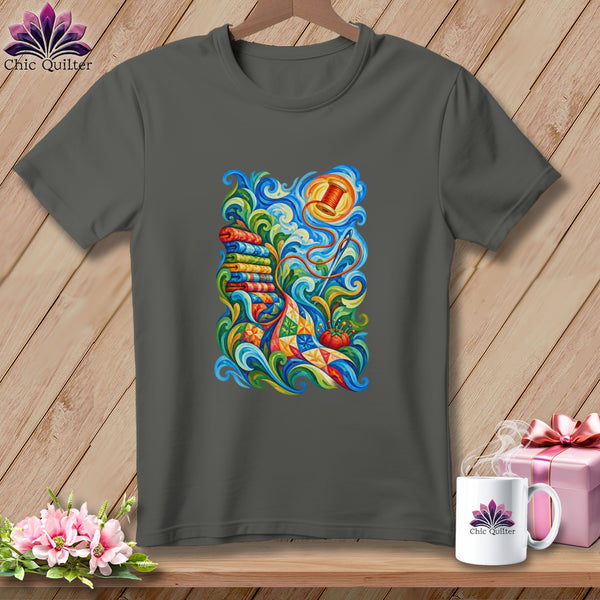 Charcoal gray t-shirt featuring a colorful quilting art graphic on the front, displayed on a wooden background.