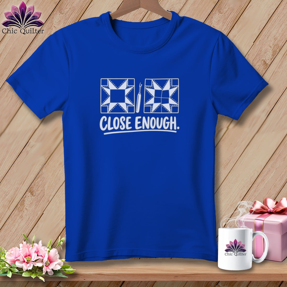 Royal blue t-shirt with quilt block and "Close Enough" graphic.