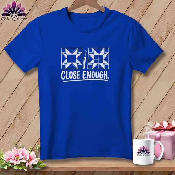 Royal blue t-shirt with quilt block and "Close Enough" graphic.